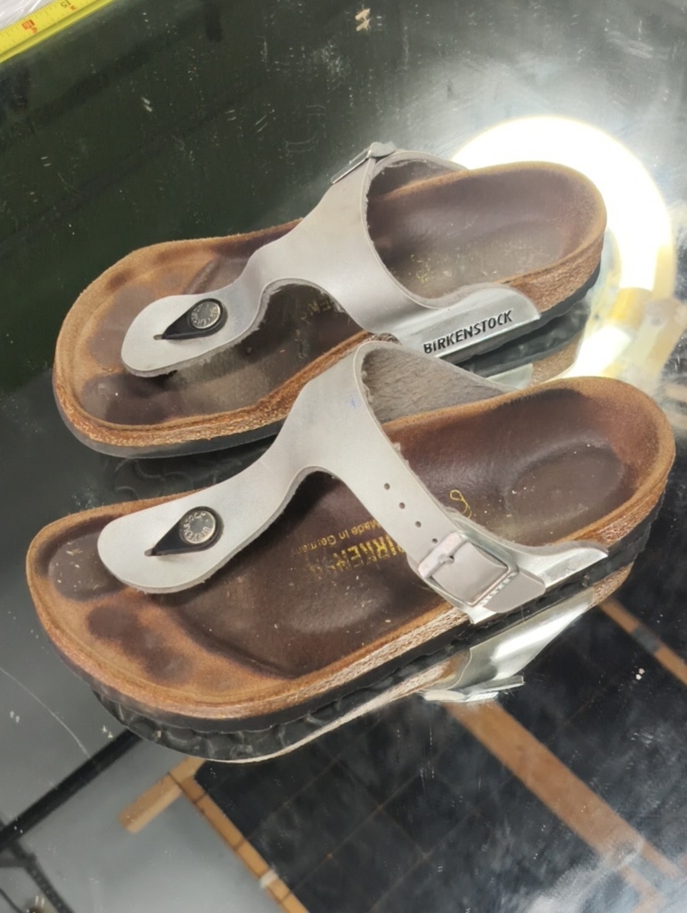 Women's 5.5 silver Birkenstock Gizeh thong sandals with a metallic finish
